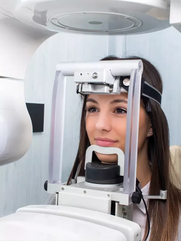 Woman receiving dental x-ray